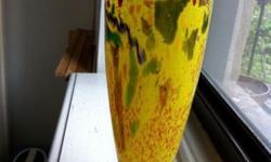 Original Kosta Boda yellow glass vase with silver decoration. Satellite collection, 11 1/4 inch tall, with original kosta boda sticker.
I am reasonable in negotiating the price, but this is a cash and carry deal
thank you
This ad was posted with the eBay