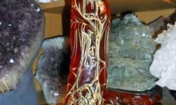 Chinese Amber hand-carved statue- Kwan-yin & Dragon Origin: China: Color: Orange/Golden Brown. Amber is the fossilized, hardened resin of trees, ranging in age from less than a million to more than 300 million years old. Amber is a powerful chakra