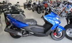 This is a 2009 Kymco Xciting 250RI Scooter in Blue. I purchased a leftover in 2011 brand new from the factory. This scooter was 5200.00 brand new. It has 4 months warrenty left. Has 3800 miles. This scooter does 80 miles a hour and has plenty of power and