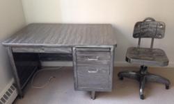 Beautiful, unique large brushed stainless steel desk with matching chair. In great condition. Ready for pickup.