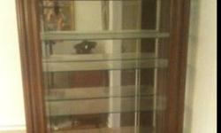 Large Glass Display Case Curio Cabinet
D 14 inches 15 3/4 at widest
W 38 1/2 40 1/2 at widest
H 79 1/8
Solid Wood
Very nice condition
Cherry
2 glass doors each side
Lights top and bottom
Bottom light fluorescent.
Need to wrap and move with at least two