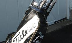 Here is an all leather Titleist golf bag that was made in the U.S.A. It has Paul Zurek's name stamped on the front. In case you did not know, Paul is a golf pro in West Palm Beach, Florida.It comes with the original shoulder strap and rain cover. Included