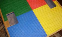 Koala Bear Kare Lego table with over 160 Duplo Legos. You can see from the picture that there are lots of special pieces included with the table. There is also a blue piece of the base that is missing. The table also has 2 storage bags for the Legos.
Also