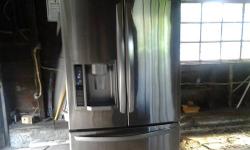 We have FOR SALE a very nice LG Stainless Steel Refrigerator. It has the french door top and the pull out drawer for the bottom freezer. Has ice/water dispenser built-in. Call to come and see :) MIKE RYAN 782-3779.