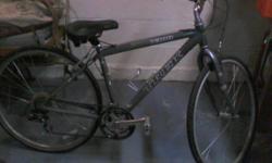 like new blue schwinn meridian 26 inch adults bicycle with attached basket. only used a few times.