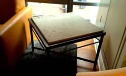 This living room set (1) limestone coffee table and (1) limestone end table is in excellent condition. Each table has a limestone top and metal base with a pewter hue. The pictures speak for themselves - these pieces will surely be a welcome addition to