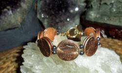 Lincoln Shield Penny Bracelet has 7 coins in Front and has 7 inside Bracelet. Coins are Authentic and Dates in Front of Bracelet are 2010-P, 2011-P, 1012-P and 2013-P and the inside dates are 2011-P, 2012-P, and 2013-P. The Coins are Brilliant