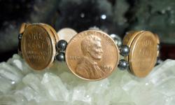 Lincoln Wheat Penny Bracelet has 8 coins in Front and has 8 inside Bracelet. Coins are Authentic and Dates in Front of Bracelet are 1954-D, 1955-D, 1956-D and 1957-D and the inside dates are 1955-D, 1956-D. 1957-D and 1958-D. The coins are copper, extra
