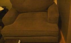 Up for sale are the living room sofa and love seat, purchased 5 years ago at Macy's furniture near the mall for $2,200.00. Yes, it has been used but it's still in great shape and is very, very, extremely comfortable! It is brown and greenish striped