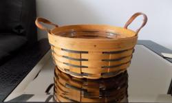 Longaberger Heartland Basket, protector included 10'' in size. Buyer pays all shipping costs in addition to the cost of the basket.