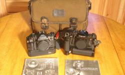 For sale I have 2 Canon A-1 Camera Body's, 1 Canon instruction booklet. One of the Canon A-1 cameras has a Canon Motor Drive MA Set with instruction booklet, the other Canon A-1 camera has an Electronic Power Winder. This is all being sold As Is, I have