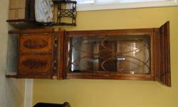 Maitland Smith mahogany display cabinet with bottom storage. Asking $1,900. Slightly negotiable. Beautiful condition.