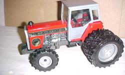 MASSEY FERGUSON MF690 2WD CAB TRACTOR, ERTL #1102 1/16 SCALE, DUAL REAR WHEELS, 1983 PHOENIX COLLECTOR SERIES SPECIAL EDITION, NEW. SOMEWHAT SHOPWORN AS IT WAS A DISPLAY MODEL, IT IS STILL NICE THOUGH, SELLING AS IS. TERMS: BANK CHECK MADE OUT TO ME OR