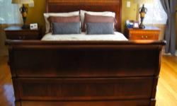 Master bedroom suite of furniture - high quality wood with inlay design - sleigh queen size bed, two nightstands, lamps, bench, large chest of drawers and armoire. Paid over $9000 selling for $5000. Buyer to pick up and cash only accepted. Thanks.