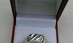 Handsome men's ring for sale.
14kt gold, very simple and stylish design. Size 8, can easily be re-sized.
Would make a perfect men's wedding ring, or just a formal ring for daily wear. Have paperwork with authenticity and value. No longer need this ring,