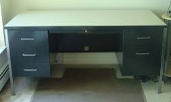 Two drawer brown metal file cabinet as pictured.
