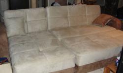 This wonderfully luxurious couch has many peices that can be kept together as shown or taken apart to spread around a room. It is very versatile to a small space or a large one. It is extremely comfortable and was purchased for a much larger price than