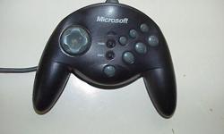 MicroSoft SideWinder Game Pad for PC or LapTop has old style game port connector and I have a converter from old style to USB port also. In excellent condition. Reduced to $25.