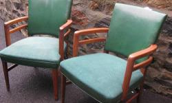These Mid-Century Modern Chairs are all original and I believe its model 2269. Made by Gunlocke in the 1950s. They're made of solid walnut, and are very sturdy and heavy. These unique arms make it a true find. The vinyl and cloth seats are in good