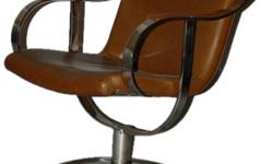 Chrome and leather chairs by Warren Planter, the designer famous for his steel wire furniture. He also worked with designers Saarinen, Loewy and Pei. These chairs were designed for Steelcase. Original brown leather supported by a solid polished steel