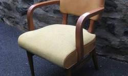 These Mid-Century Modern Chairs are all original. Made by Gunlocke in the 1950s. They're made of solid walnut, and are very sturdy and heavy. These unique arms, backrest supports and legs make it a true find. The vinyl and cloth seats are in good