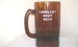 1930's-1940's MIDDLEBY ROOT BEER syrup dispenser. Giant glass mug 12" tall 7" diameter very heavy.. A rare piece of advertising. Does have a 2" triangular chip on upper rim, maybe repairable. I do not have the chipped out part. Still looks good on face