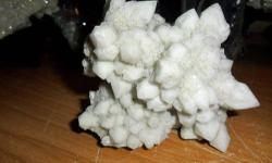 Milky White Quartz Crystal Cluster from Diamond Hill Mine South Carolina. This is a white milky Quartz crystal cluster. It makes a great display piece. Its origin is Diamond Hill, South Carolina. Some of the most unique quartz comes from Diamond Hill.