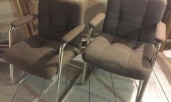 Pair of neat tubular chrome cantilever chairs attributed to Milo Baughman for Chromcraft. Manufactured in early 70s. Period shape and design make this chair a standout. Brown tufted fabric upholstery. Well-made, heavy, really comfortable chairs in very