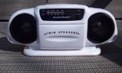 Mini AM/FM Radio
Fold Down Carry Handle
Twin Speakers
Uses Four AA Batteries - NOT INCLUDED
Telescopic Metal Antenna extends up to 12 inches
Headphone Jack
Approximately 7-1/2 inches wide x 3-1/4 inches high
Color: Tan
New
