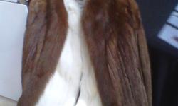 Mink Fur Coat, is for a medium size women, I also I a White Fox Fur Coat that has never been used. I want $100.00 each!
