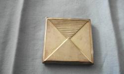 Beautifully made item which contains perfect mirrors - one normal size, and one which magnifies.
The case is silver in a 'compact'-style. Measures 6cms X 6cms.