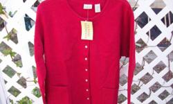 Misses Fleece Jacket
Eight Snaps to Open and Close the Jacket
Two Pockets in Front
Machine Washable
Size: XL
Color: Red
New and Never Worn - With Tag
Made by: Classic Elements for Sears