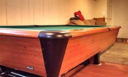 Mizerak Pool table in good condition. It's just taking up space here and needs a new home. The price can be negotiated within reason.