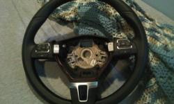 This MOMO leather Montecarlo steering wheel is Mod. MCL 32BK 1B and made in Italy . It is brand new but my honey threw the box out so that's gone. I did drill three holes in the hub to adapt it to my coupe but the 320 mm / 12 1/2" size made it too hard to