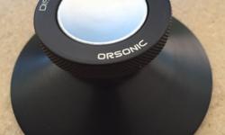 An original Monster {Orsonic} record clamp & weight, which has a spring activated collett, spindle clamping action, and works beautifully on most any turntable, to lock the record down to the platter, and reduce slippage and resonances. This is a great