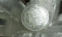 Morgan Silver Dollar 1884-S Extra Fine to AU-Very Rare Coin a little toning. The obverse [face] of the coin has a full and Clear markings crown, hair face and the reverse [eagle] also show all it?s clear markings of its body feathers and lettering.Very