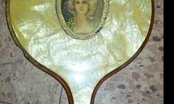 Mother of pearl hand mirror (old) small
Damage along the edge but it?s a genuine antique
Most likely art deco price is open maybe free
Pick up only and look over other stuff paintings oil and prints
Lots of goodies buy something else and this is a gift.