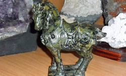 Multi-Color Jade Antique Carved Horse- This is a beautiful Antique carved horse out of multi-color Jade: multi colors of browns. This horse is hand carved from the country of China. Good luck stone, prosperity, deep wisdom, compassion, peace, balancing of