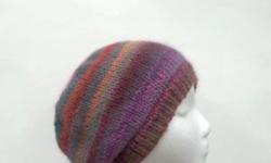 A fun beanie hat that will cheer you up. Very colorful beanie beret in stripes. The colors in this beanie beret slouch are purple, blue,gold,plum,pink,lavender and more. Very stretchy, will fit any head, stretches out to 31 inches around. Available at:
