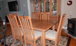Beautiful Thomasville Solid Oak Dining Room Set, China Cabinet, table with two leaves, six chairs. Table needs refinishing or a table cloth, and chairs can be easily recovered. Set over $6000.00 new. From clean, smoke free home. Table extends 71 1/2"- 107