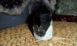 Natural Smokey Quartz Point-This Smokey Point has amethyst stones embedded in to the point. This is customized. This is a beautiful Natural point of dark brown/black Smokey quartz in color and is Perfect with Perfection. Smokey Quartz has these amazing