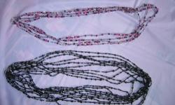 CRYSTAL NECKLACES
---- over the head black and clear crystal faceted beads, sparkly and irridescent seed bead spacers, 36"long - $8 ea, $15 for two....or set of 9 for amazing neck piece $60
---over the head amethyst with faceted purple crystals and seed