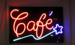THIS IS A THREE COLOR NEON "CAFE" WITH SHOOTING STAR DISPLAY SIGN. THiS WAS INSTALLED IN A PRIVATE HOME AND COMES WITH THE COMMERCIAL QUALITY HIGH VOLTAGE TRANSFORMER THAT CAN BE MOUNTED AWAY FROM THE ACTUAL SIGN. THE NEON GLASS IS MOUNTED ON A
