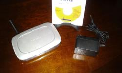 108 Mbps 802.11g Wireless Firewall Router with 4-port 10/100 Mbps switch.
Excellent condition includes router, AC power supply, installation CD, and router stand.