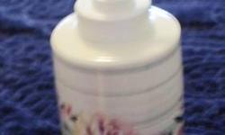 never-used Croscill lotion bottle in original box. The pattern is Vienna. It is approximately 6" high.
