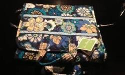 Brand new Vera Bradley hanging organizer makeup bag in mod floral blue pattern. Brand new with tags, and gift quality. Email, text or call if interested or if you'd like to see more photos. 516-659-7497. It can easily be mailed, and price includes