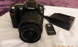 Nikon D50 interchangeable-lens digital SLR camera. Great Entry level camera for a Photographer or Inthusiust. It has a crack on the screen but works just as great as it did when it was new. It also has a "remote" to snap pics on command, so you can