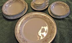 Noritake China (1960's) Lindsay Pattern Number: 6106. Service for 12.
Each place setting includes: 10 1/2 in Dinner Plate, 8 1/4 in Salad Plate, 6 3/8 Bread and Butter Plate, 7 1/2 in Soup Bowl, Footed Cup with 2 1/4 in Saucer, 5 5/8 in Dessert Dish.
Also