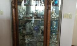 oak curio heavily carved beveled glass price is negotiable