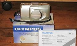 Olympus Stylus Epic 35mm zoom 170 camera with a 38-170mm zoom. All weather design. Includes hand strap, instructions and box. New, never used. Great little camera with multiple modes and flash.